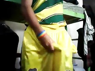Teenboy sagging in shiny yellow shorts