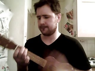 ukulele que juega el